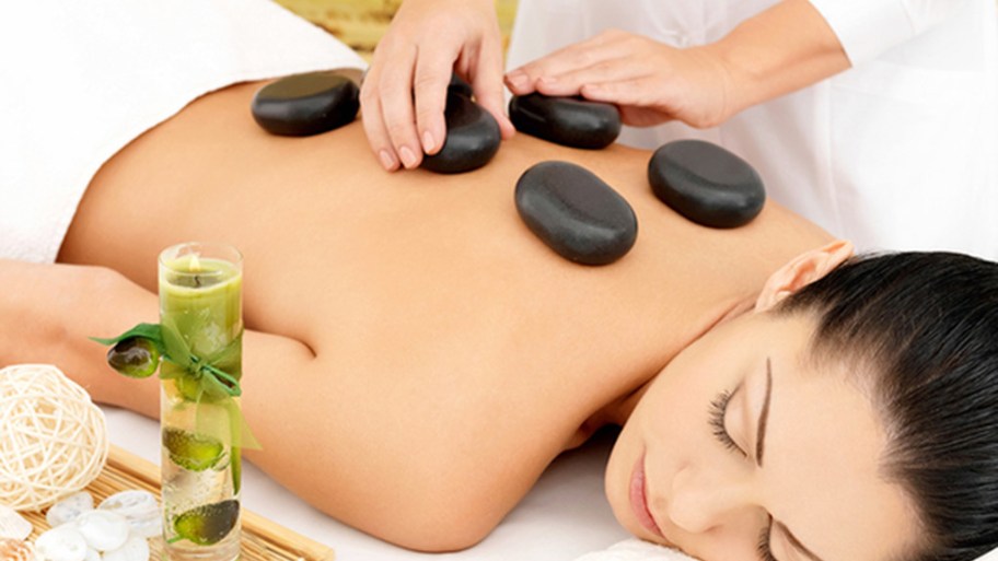 The therapist starts with gentle, slow movements on the front body to ease muscle tightness