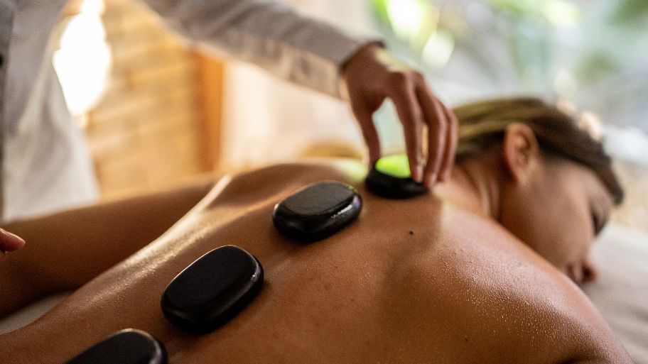 Discover top 6 benefits of hot stone massage for sleep Creates a soothing bedtime experience
