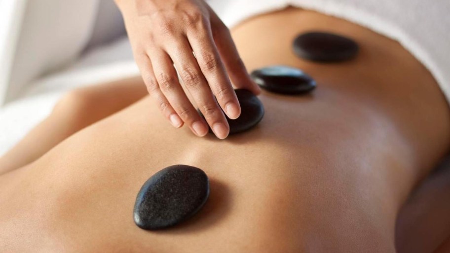 A hot stone massage is a type of massage therapy