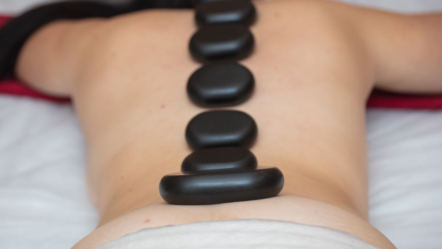 Discover the secrets behind hot stone massage How often should you get hot stone massage therapy?