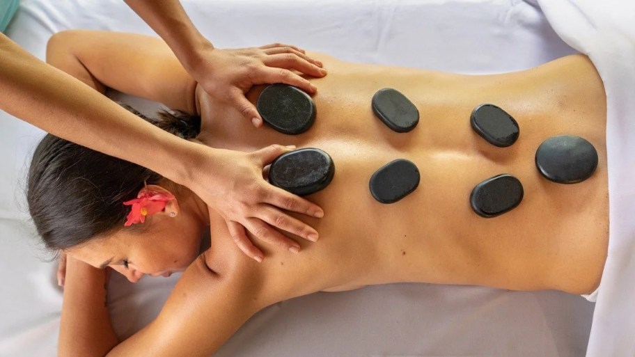 The benefits of hot stone massage become even more apparent when performed regularly over a long period